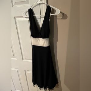 Charlotte Russe Dress. Black with ivory tie back. Size medium. New with tags.